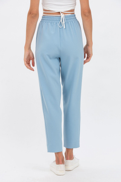 Вільні жіночі штани з костюмної тканини блакитного кольору Норіс