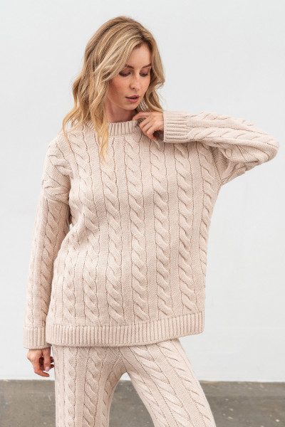 В'язаний жіночий костюм бежевого кольору джемпер та штани 4598/2024 В'язаний жіночий костюм бежевого кольору джемпер та штани 4598/2024