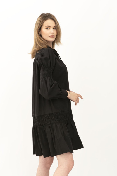 Чорне жіноче плаття А-силуету з коміром-стійкою та рюшами Лам'є 01 Чорне жіноче плаття А-силуету з коміром-стійкою та рюшами Лам'є 01