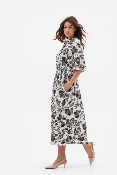 Сукня вільного силуету міді довжини з рукавами до ліктя Міара Сукня вільного силуету міді довжини з рукавами до ліктя Міара