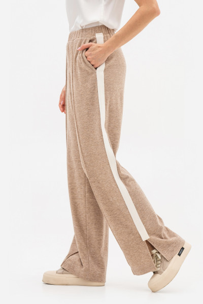 Трикотажні брюки бежевого кольору з лампасами Кіріса