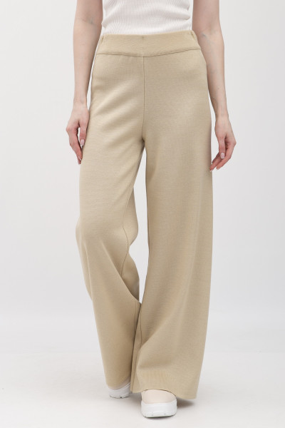 Брюки прямі трикотажні бежевого кольору 25218000