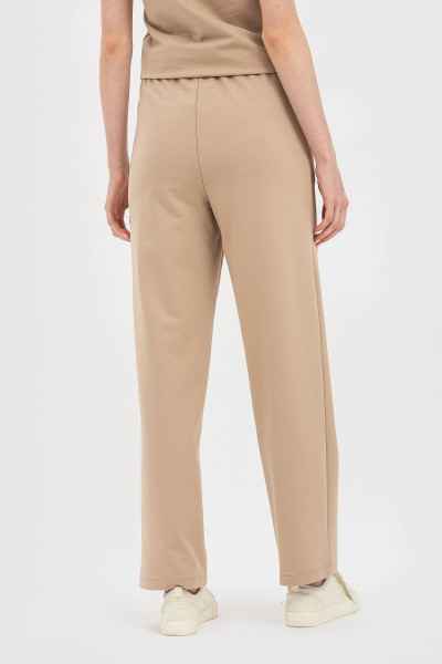 Жіночі штани вільного крою прямого силуету з трикотажу бежевого відтінку Аморет