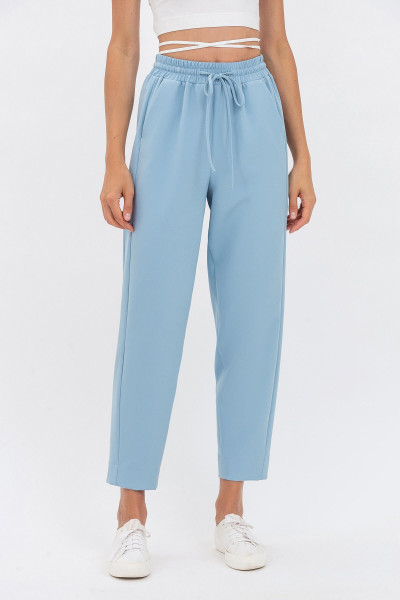 Вільні жіночі штани з костюмної тканини блакитного кольору Норіс