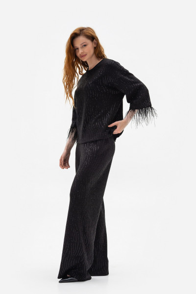 Чорні трикотажні брюки вільного крою Леврес