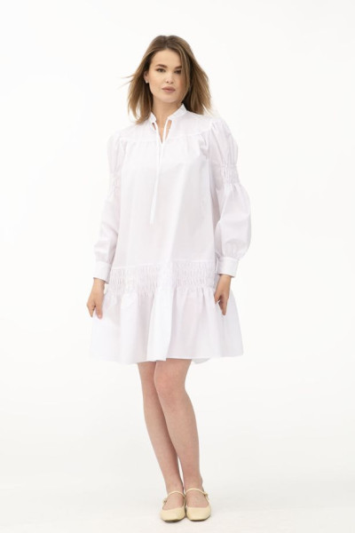 Біле жіноче плаття А-силуету з коміром-стійкою та рюшами Лам'є Біле жіноче плаття А-силуету з коміром-стійкою та рюшами Лам'є