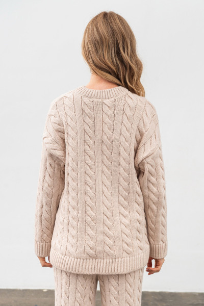 В'язаний жіночий костюм бежевого кольору джемпер та штани 4598/2024 В'язаний жіночий костюм бежевого кольору джемпер та штани 4598/2024