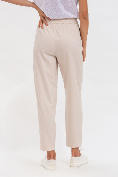 Бежеві жіночі штани прямого силуету на поясі-резинці Саміна